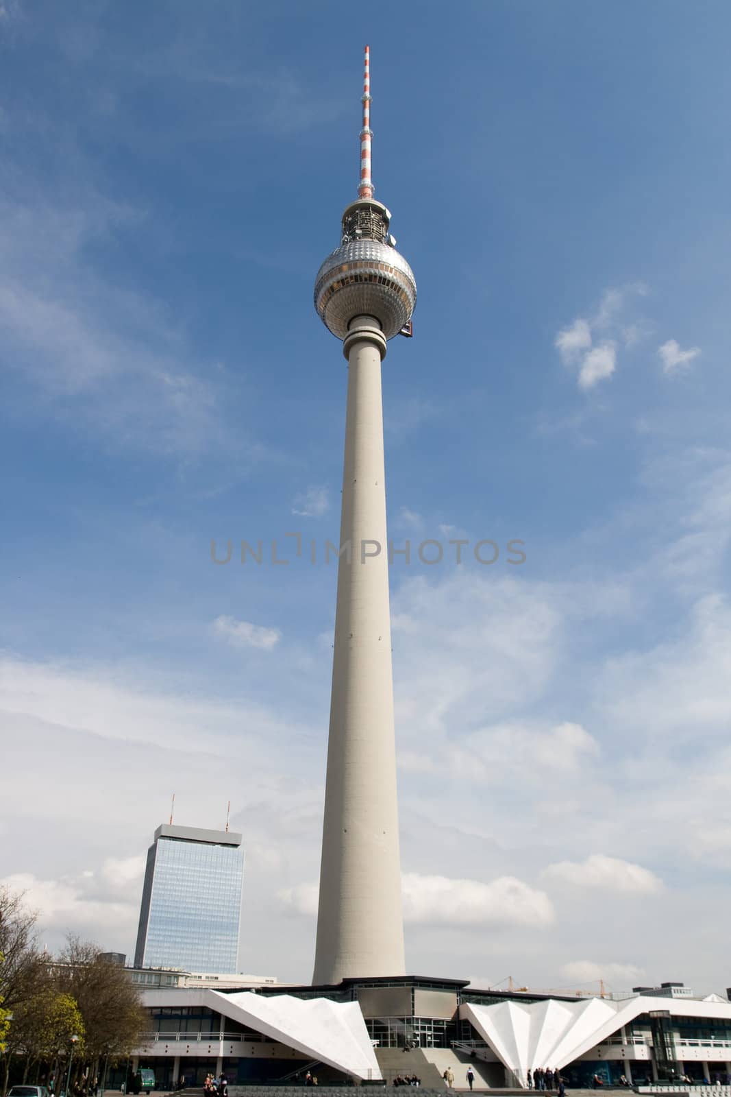 Berlin TV tower agaist blue sky with white clouds