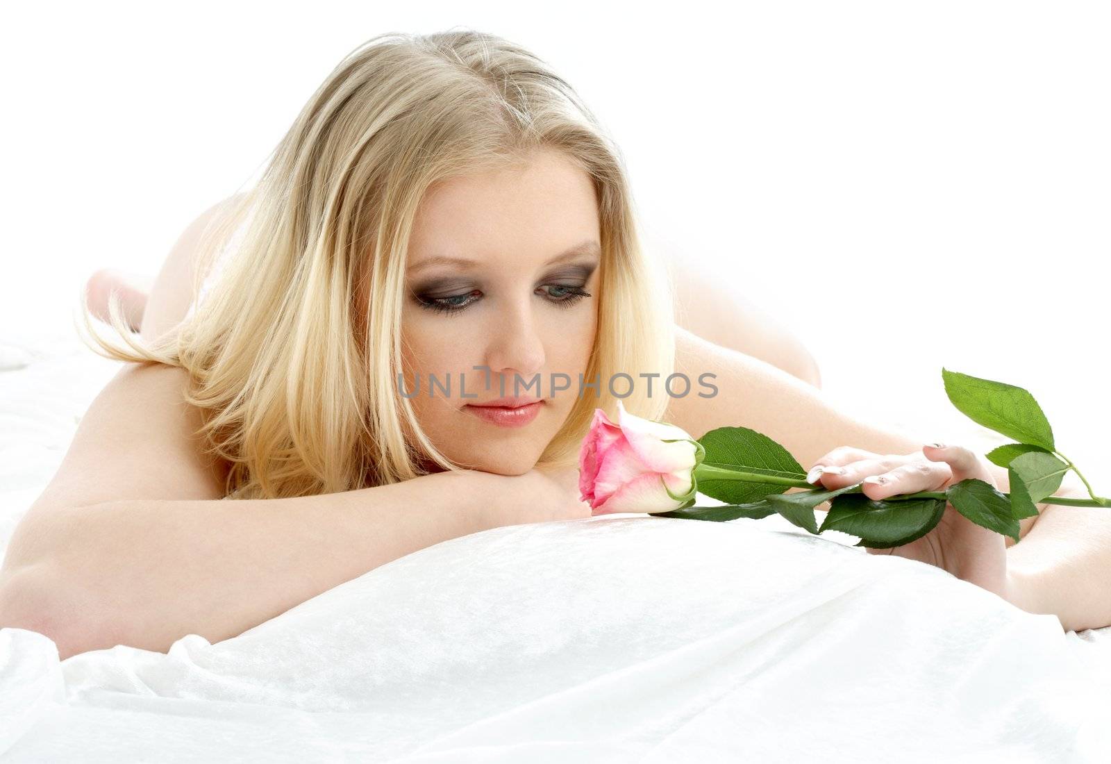 lovely blond with rose in bed by dolgachov
