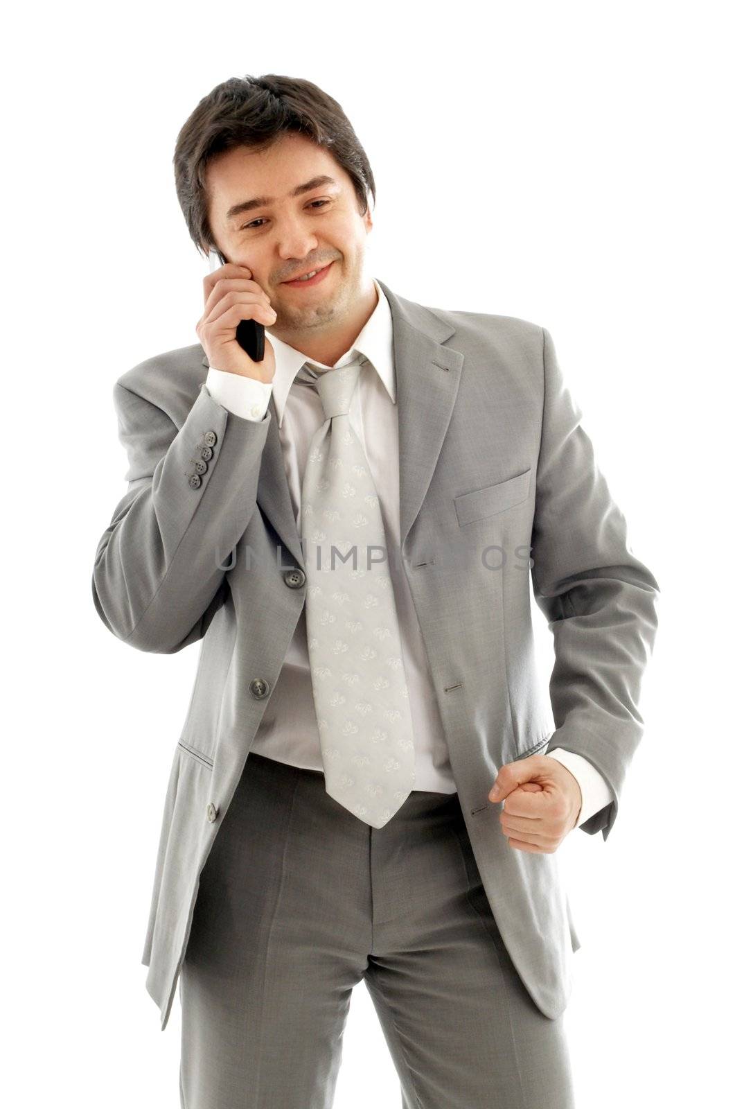 businessman with cellular phone in grey suit over white