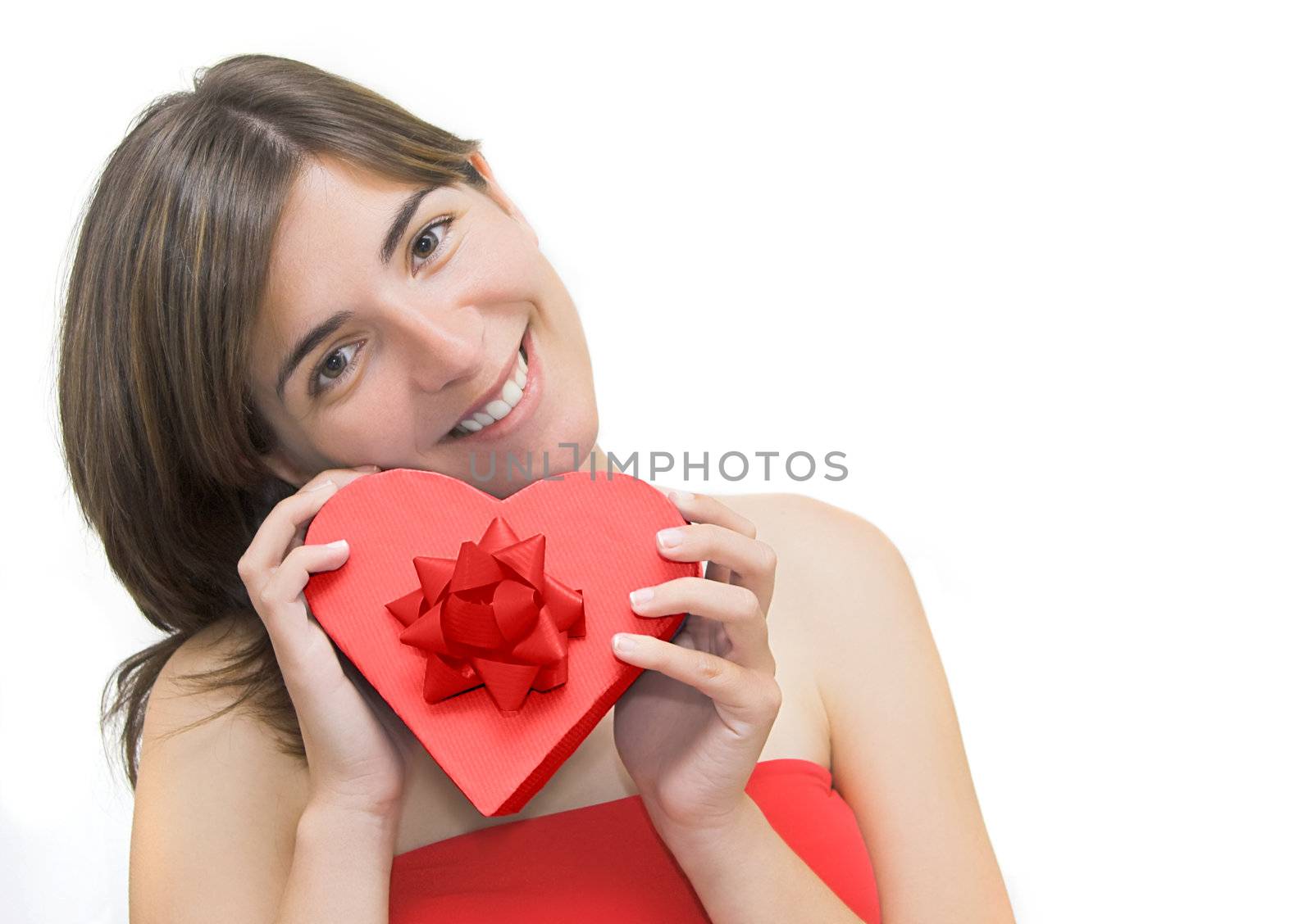 Beautiful woman with a heart gift on is hands