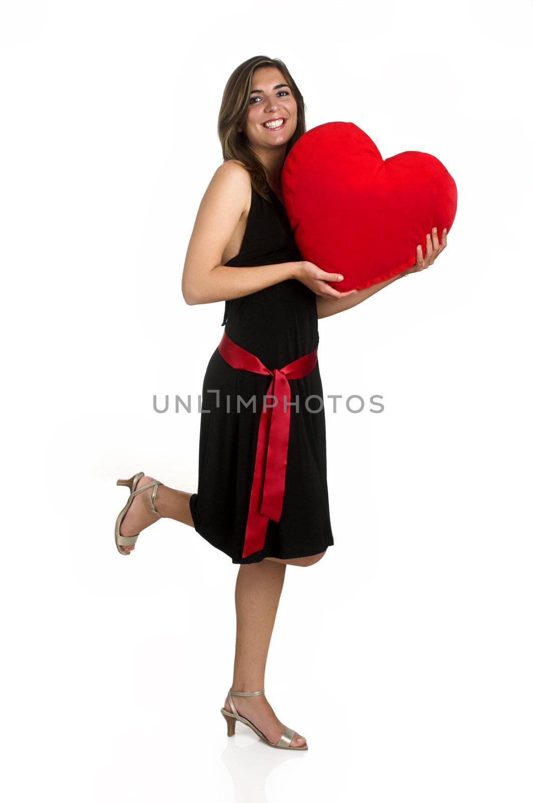 Beautiful woman with a heart on the hands