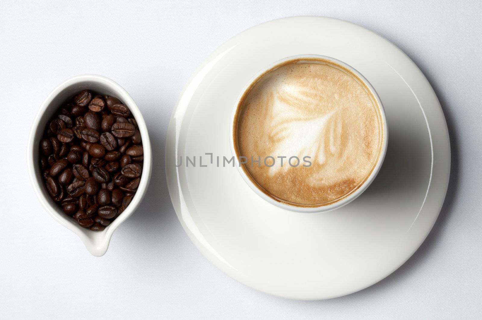 barista coffee cup and colombian coffee beans