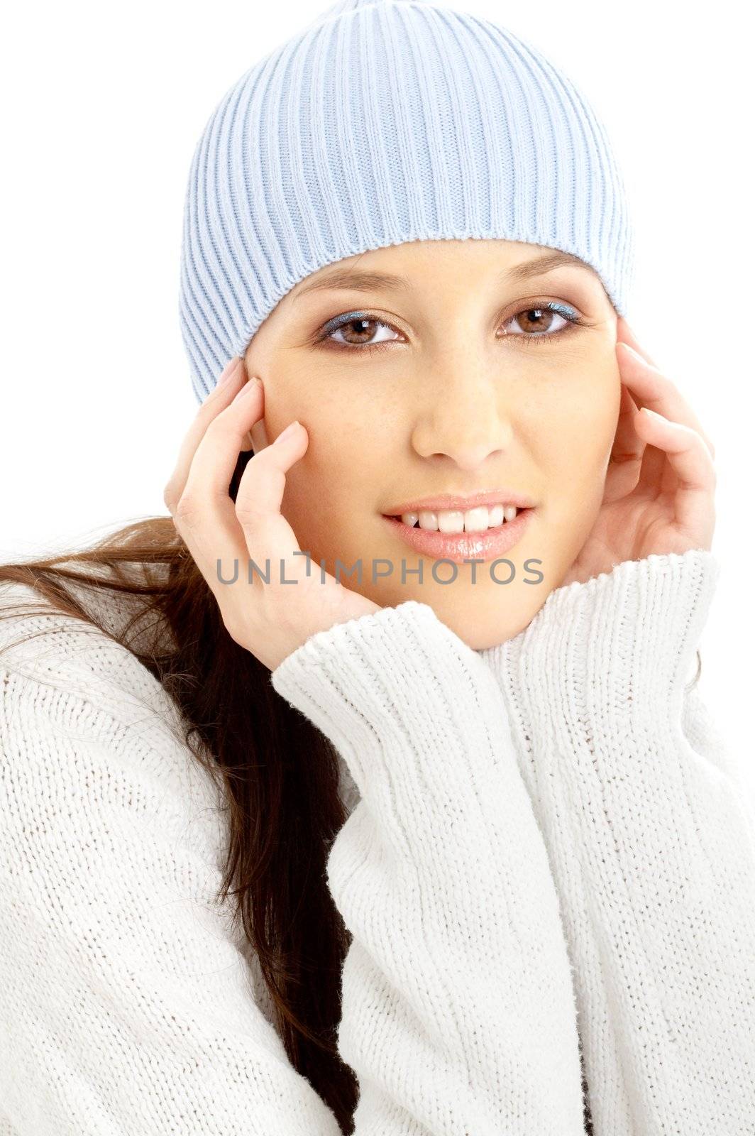 portrait of lovely brunette in winter hat