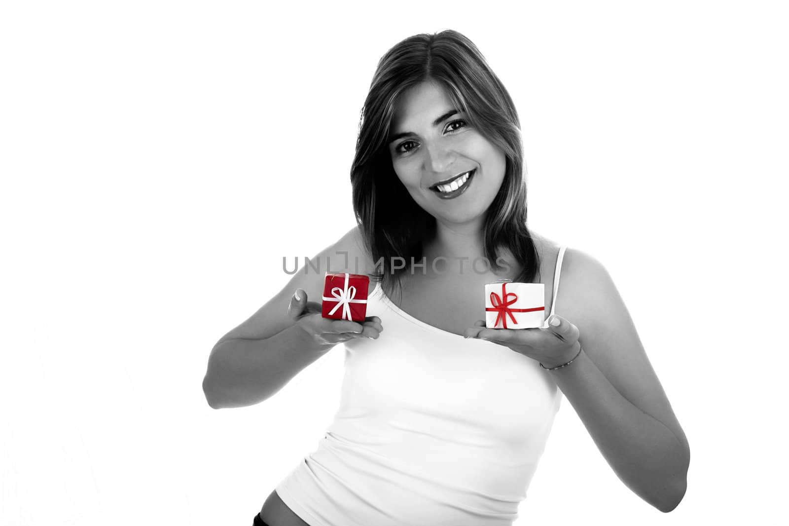 Christmas season! Different poses of a beautiful woman with small gifts on the hands. (desaturated woman with colored gifts)