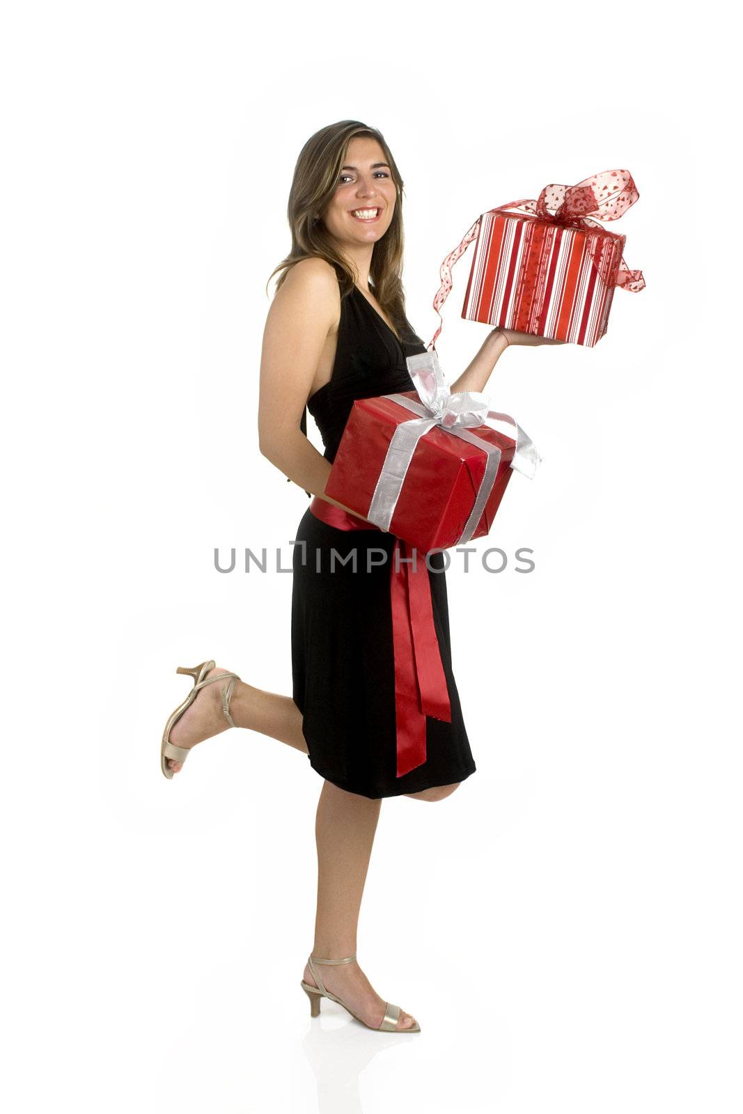 Happy woman isolated on a white background with presents.