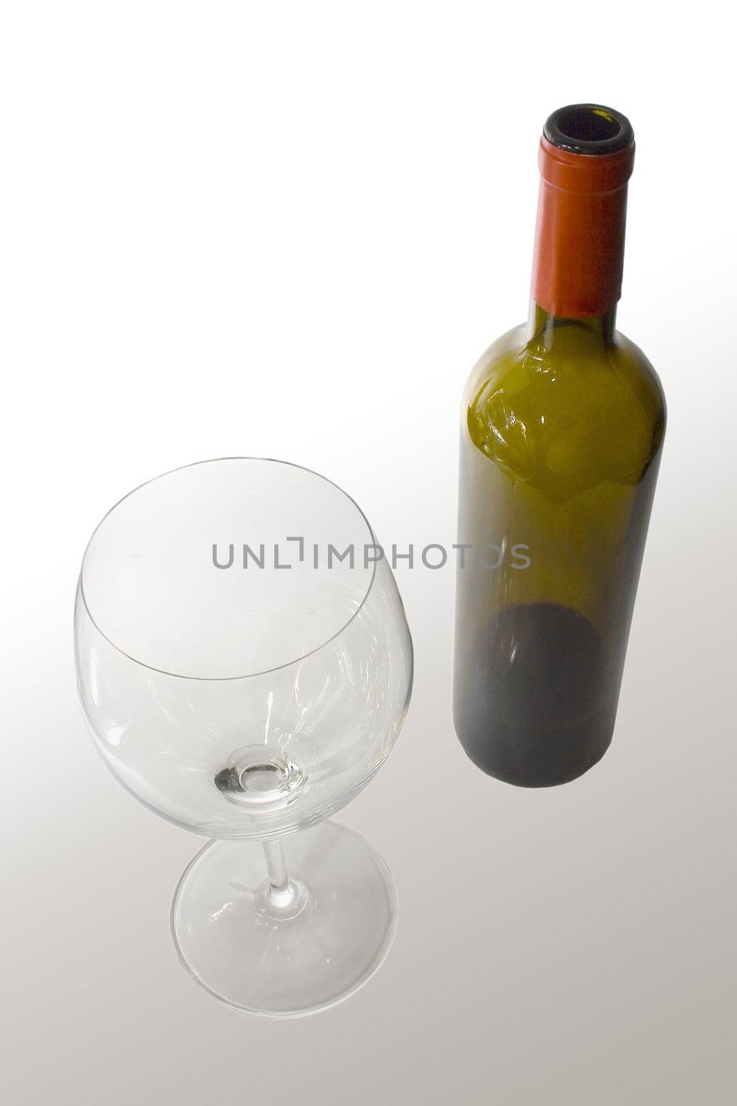 Bottle and glass cup of good wine