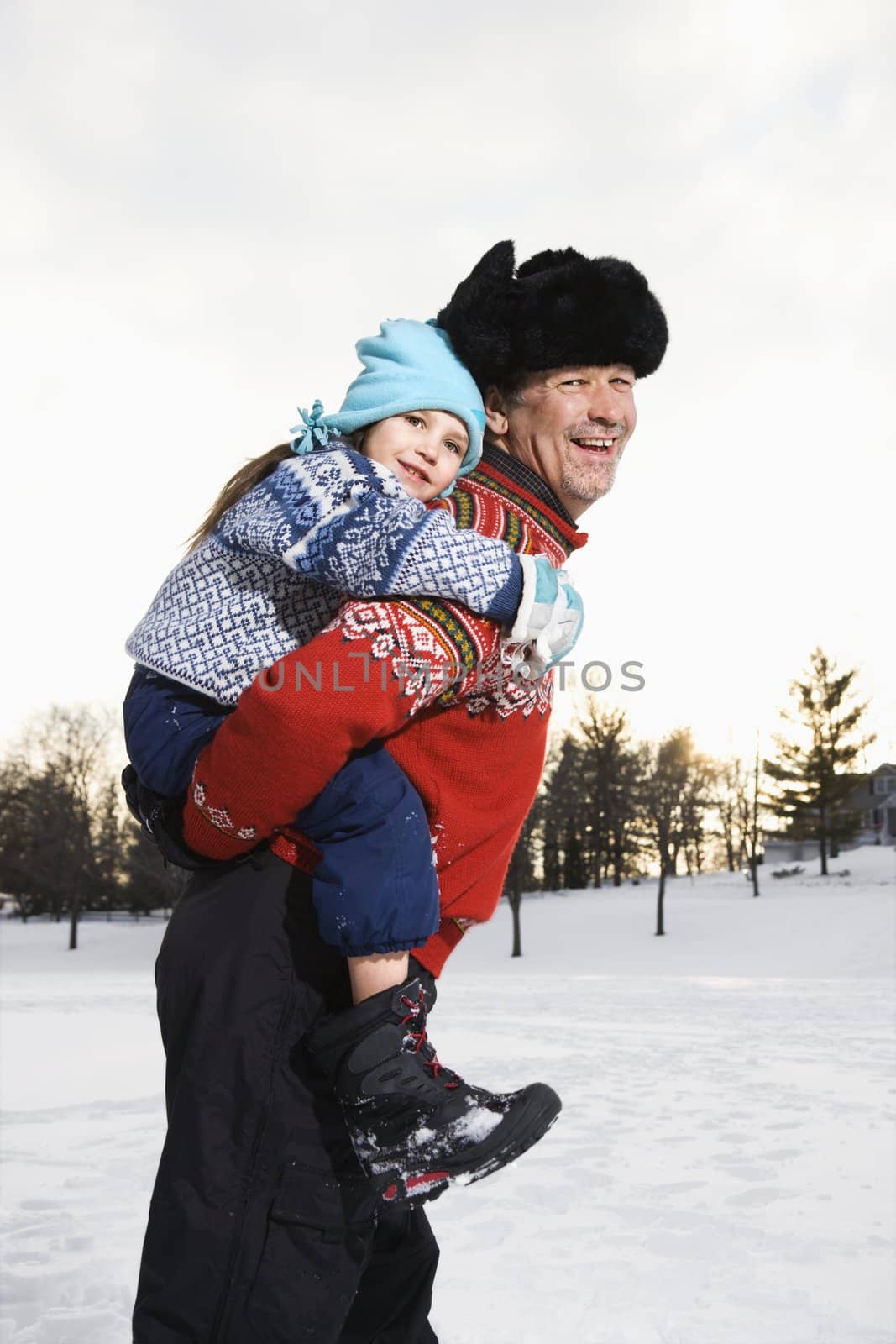 Man holding child. by iofoto