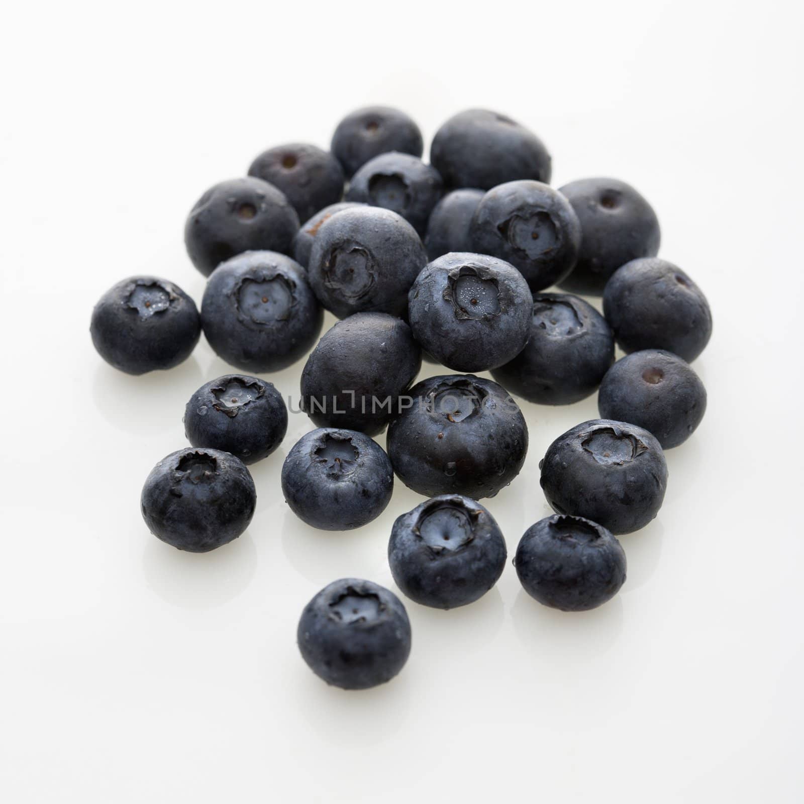 Group of blueberries on white background.