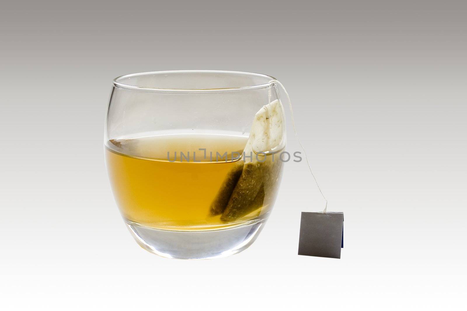 a glass with full of healthy tea