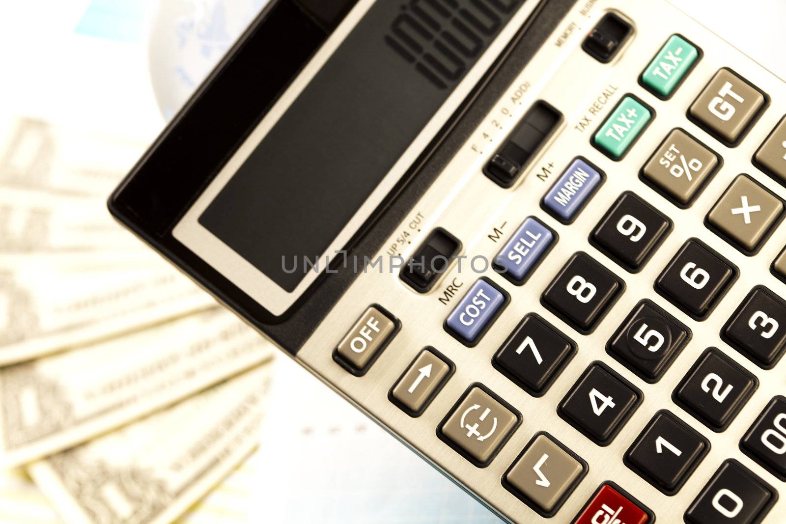 Money and calculator by JanPietruszka