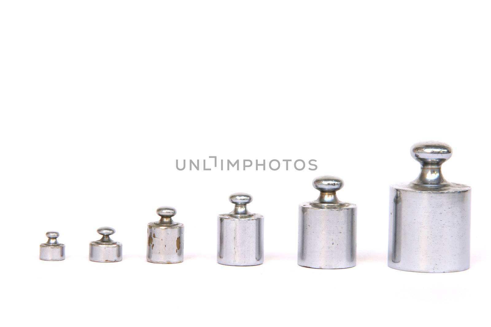 balance weight units in a row isolated on white background with copy space