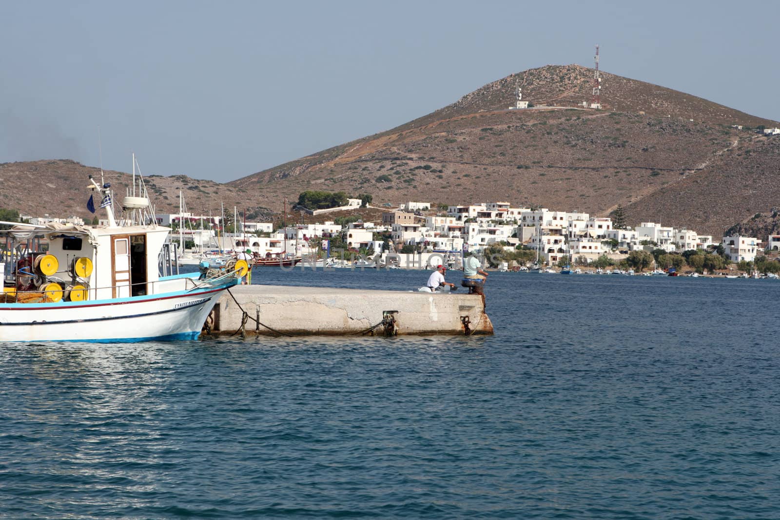fishing at the port of skala patmos island dodecanese greece