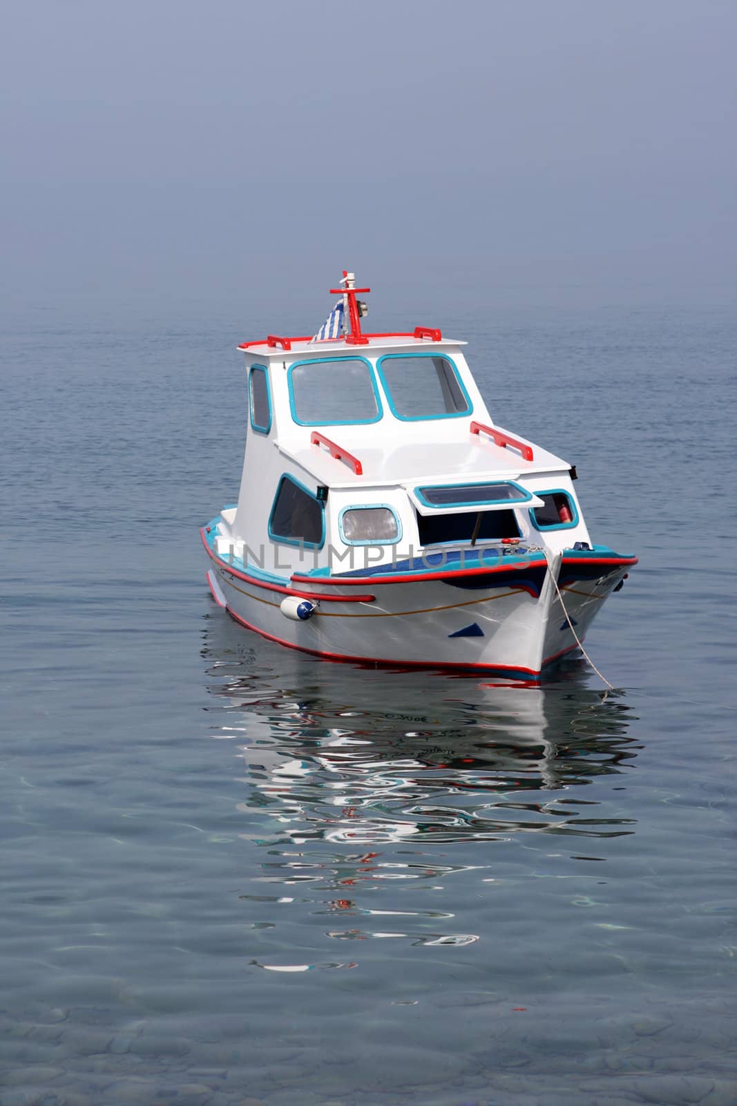 colorful traditional greek small wooden fishing  boat