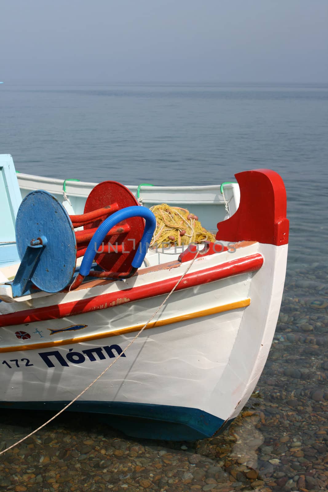 traditional wooden fishing boat detail patmos island greece