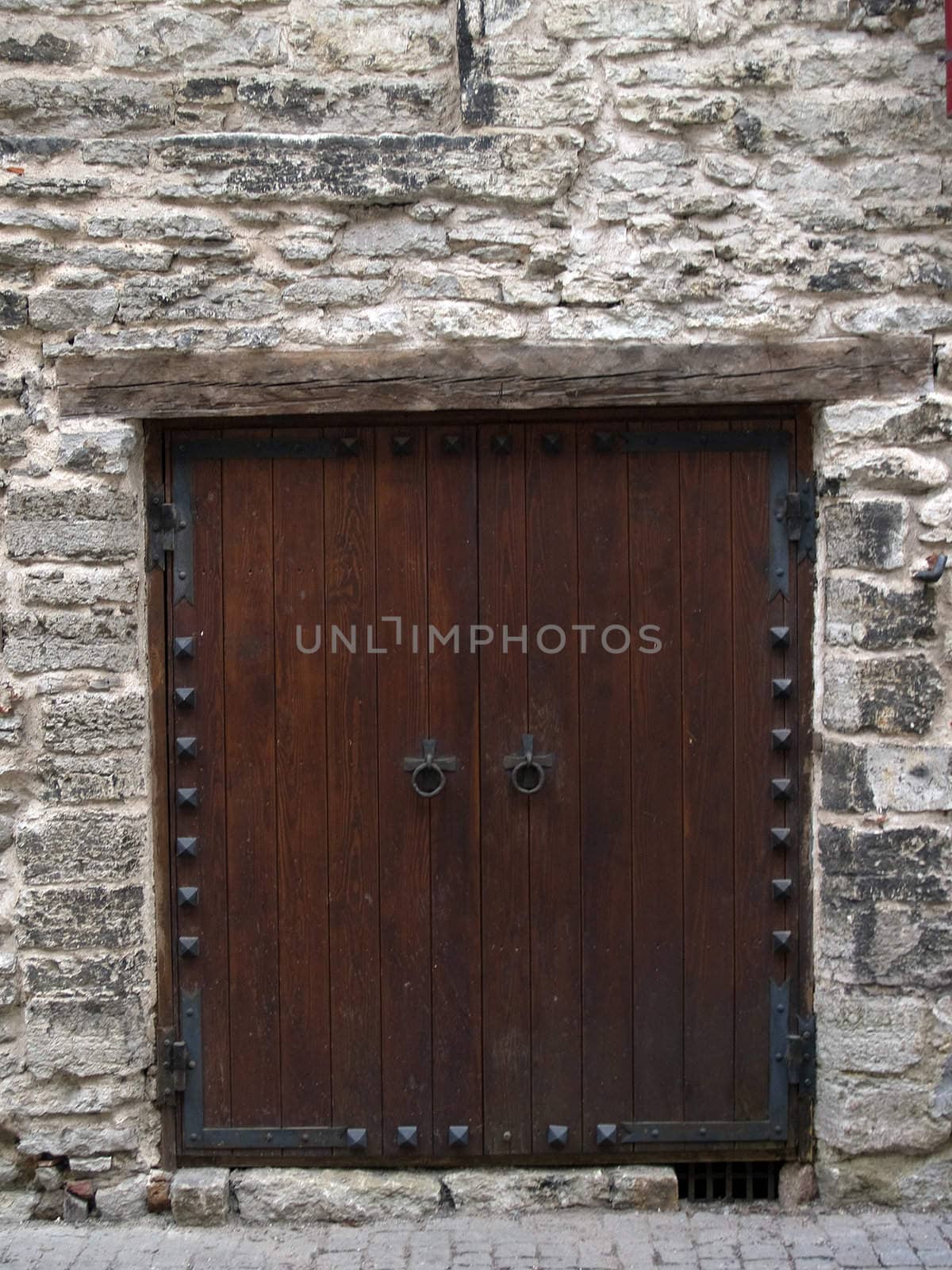 Architectural details a Doors in a tower of ancient city by lem