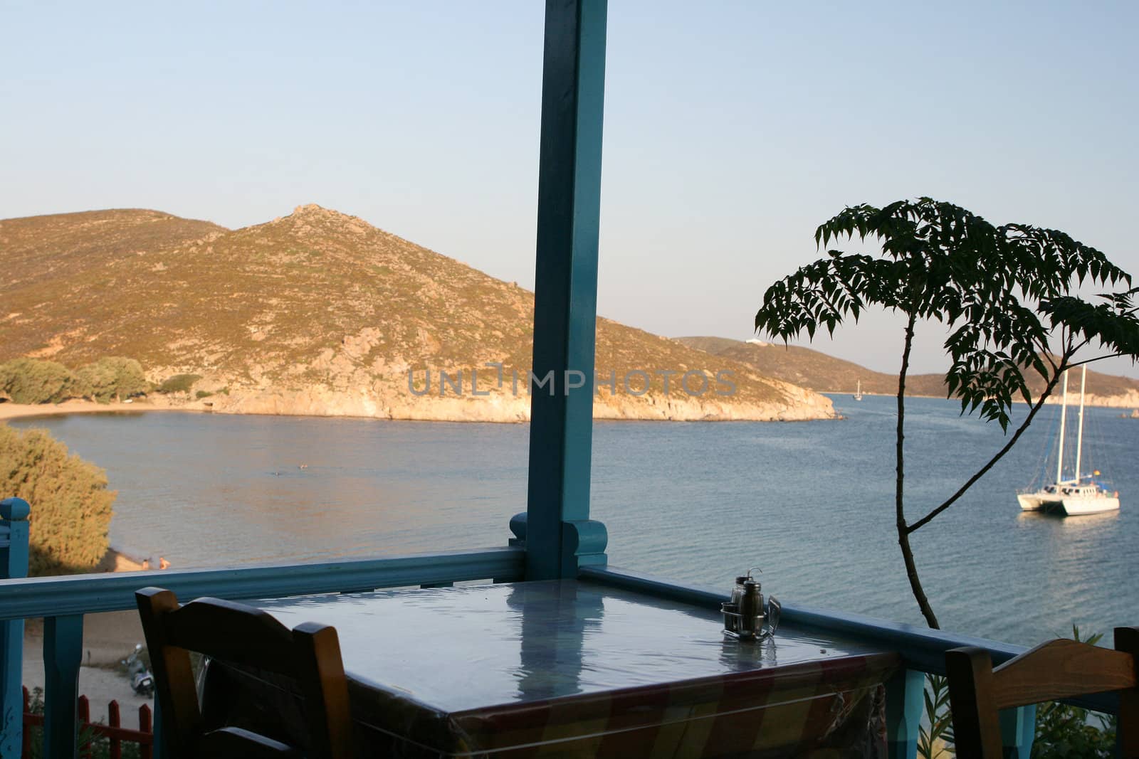 detail from greek restaurant with nice terrace above the sea