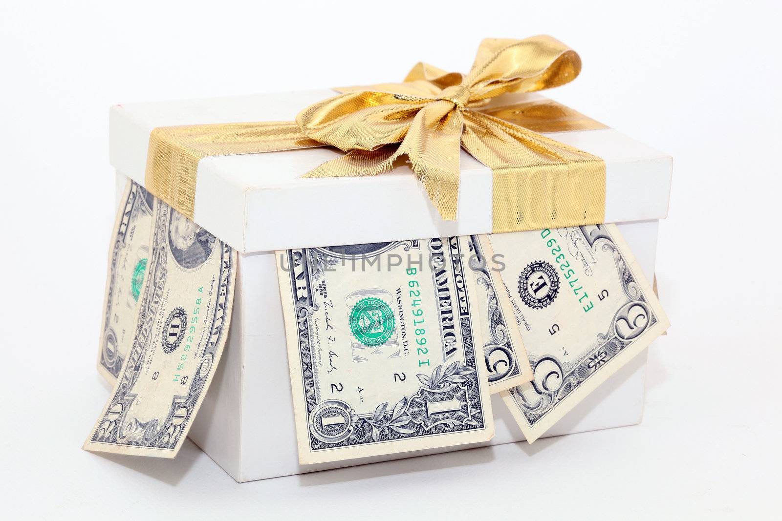 expensive white gift box with gold ribbon and bow and dollars