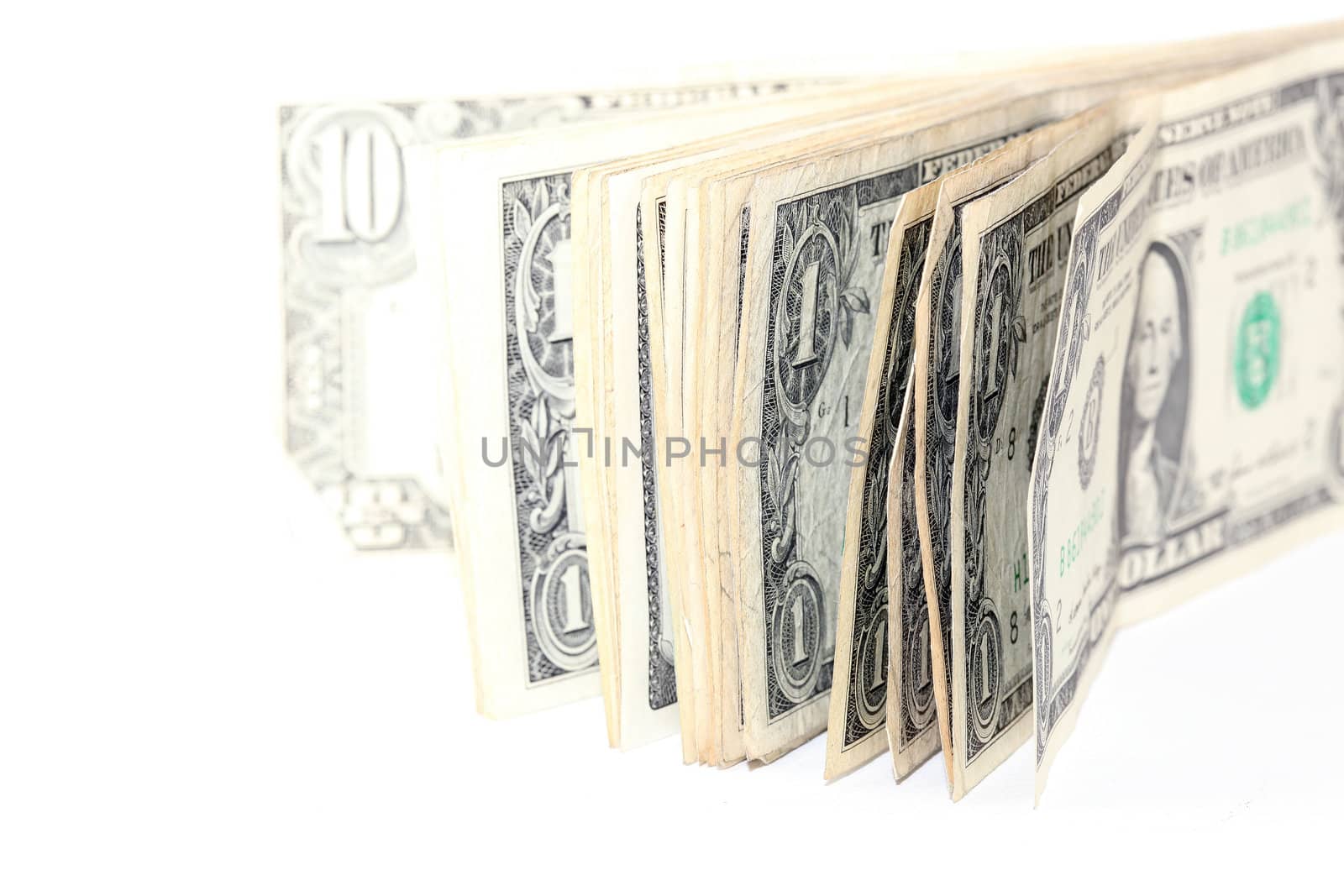 used dollar banknotes isolated on white background