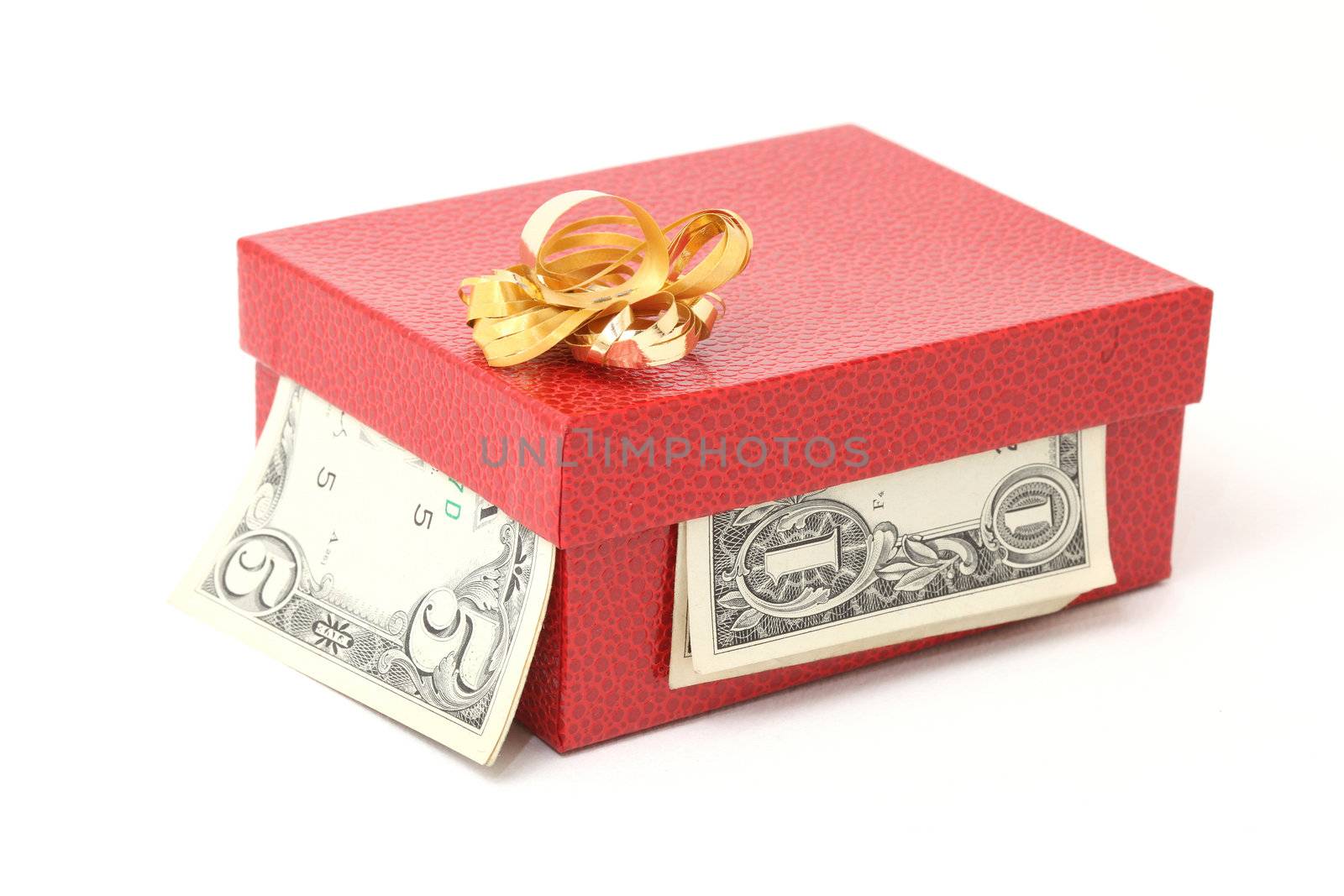 expensive red gift box with gold bow and dollars isolated