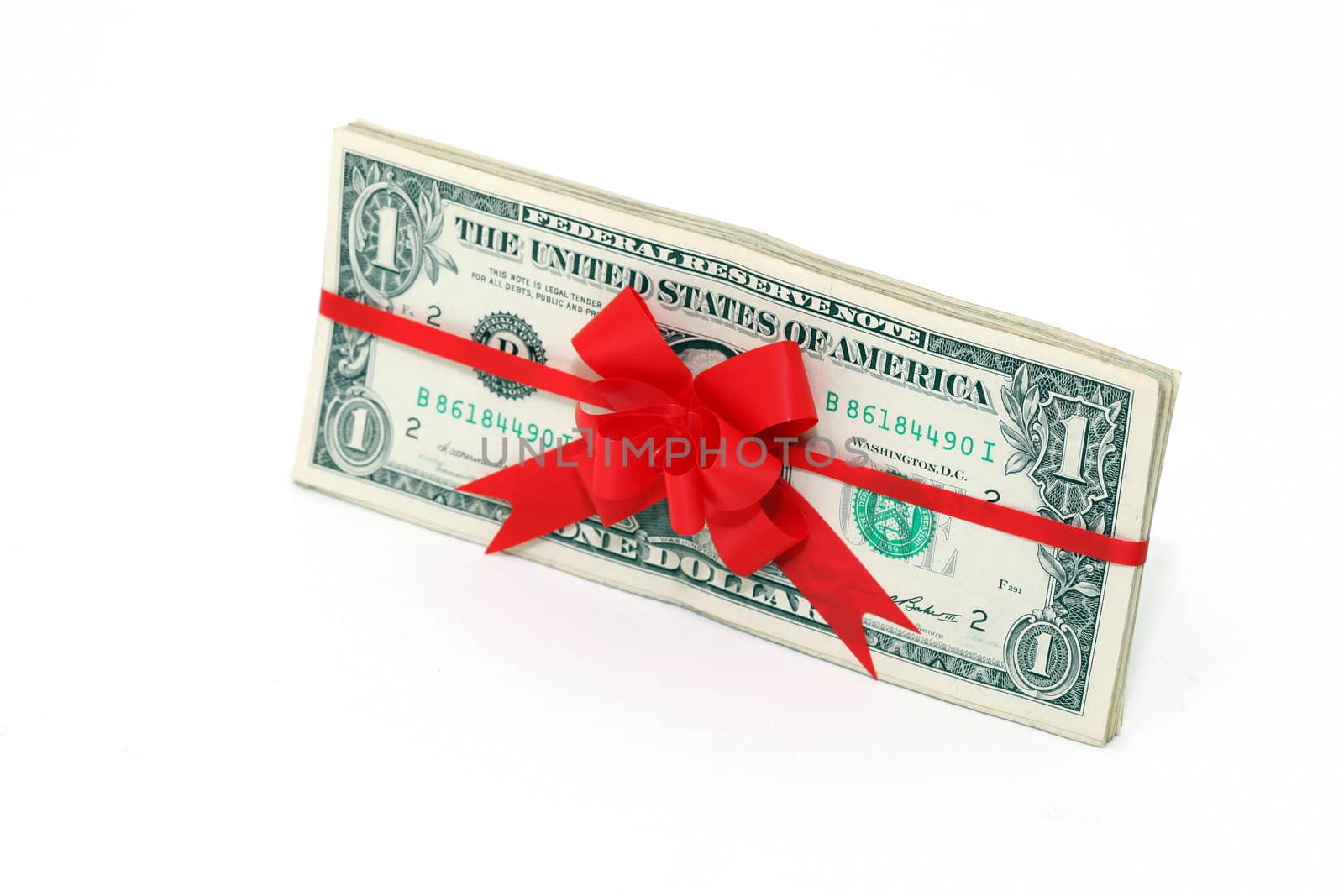 dollars gift banknotes present with red ribon and bow isolated