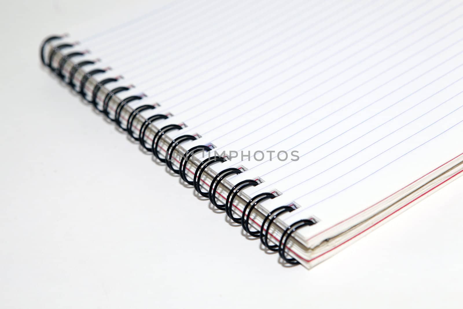 business objects closeup detail of spiral notepad with copyspace