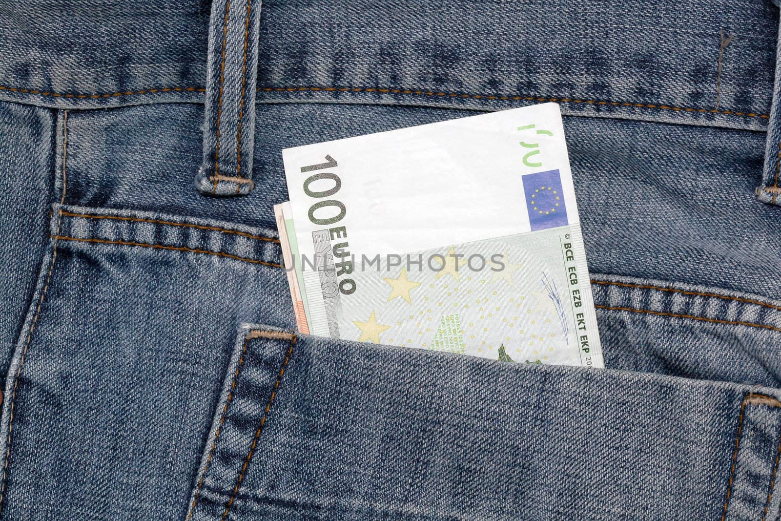 blue jean and hundred euro banknotes