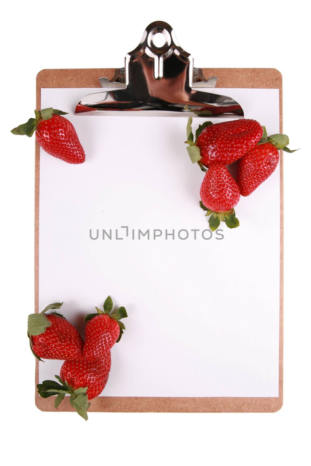 Strawberries on clipboard, healthy snack concept, isolated on white