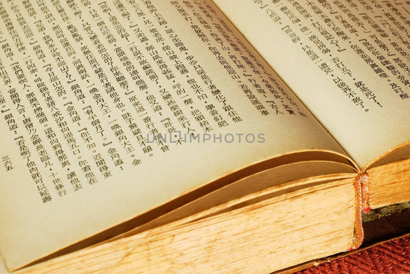 It is a Chinese book opened. You can look at that words so clear.