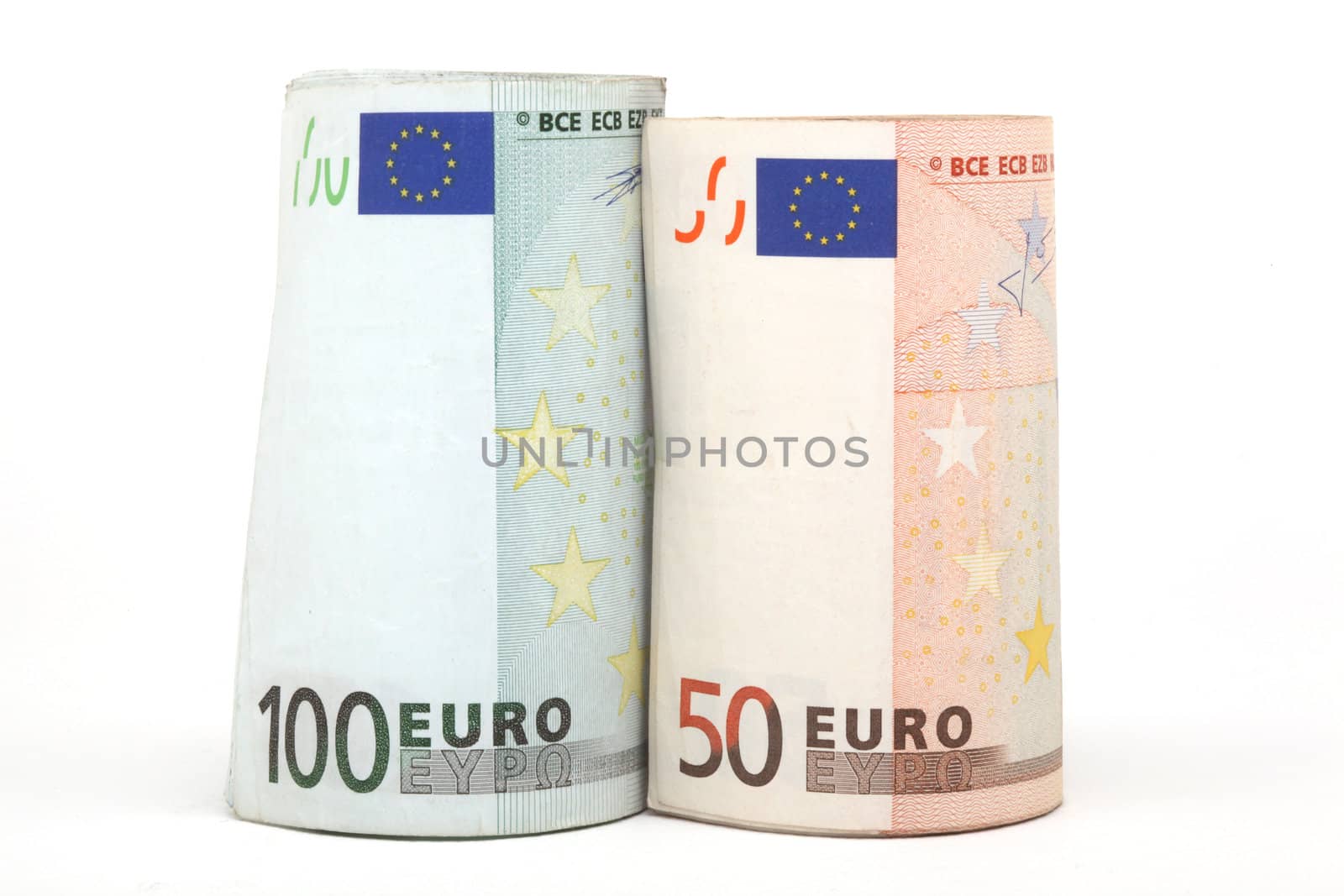 closeup rolled euro banknotes fifty and hundred isolated on white