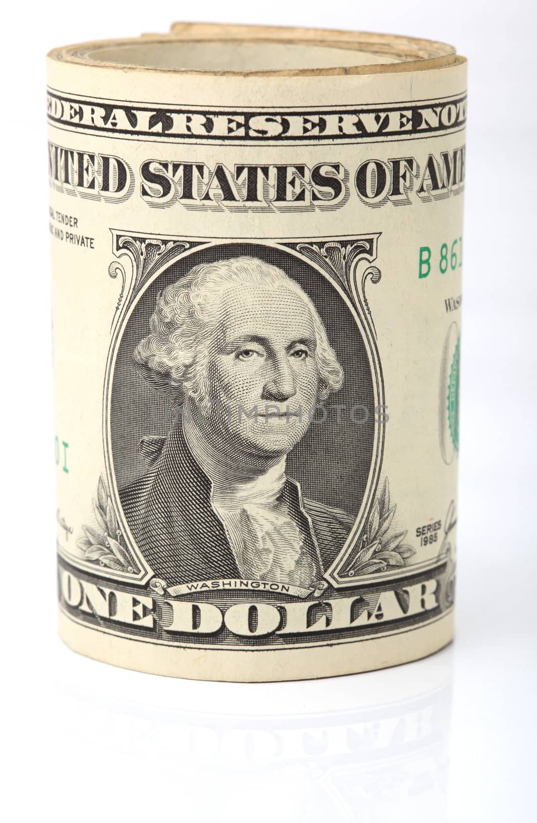 rolled dollar banknotes closeup isolated on white background