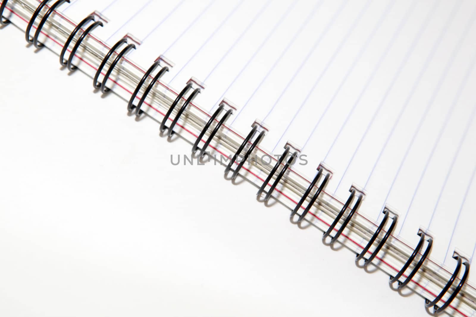 business objects closeup detail of spiral notepad with copyspace