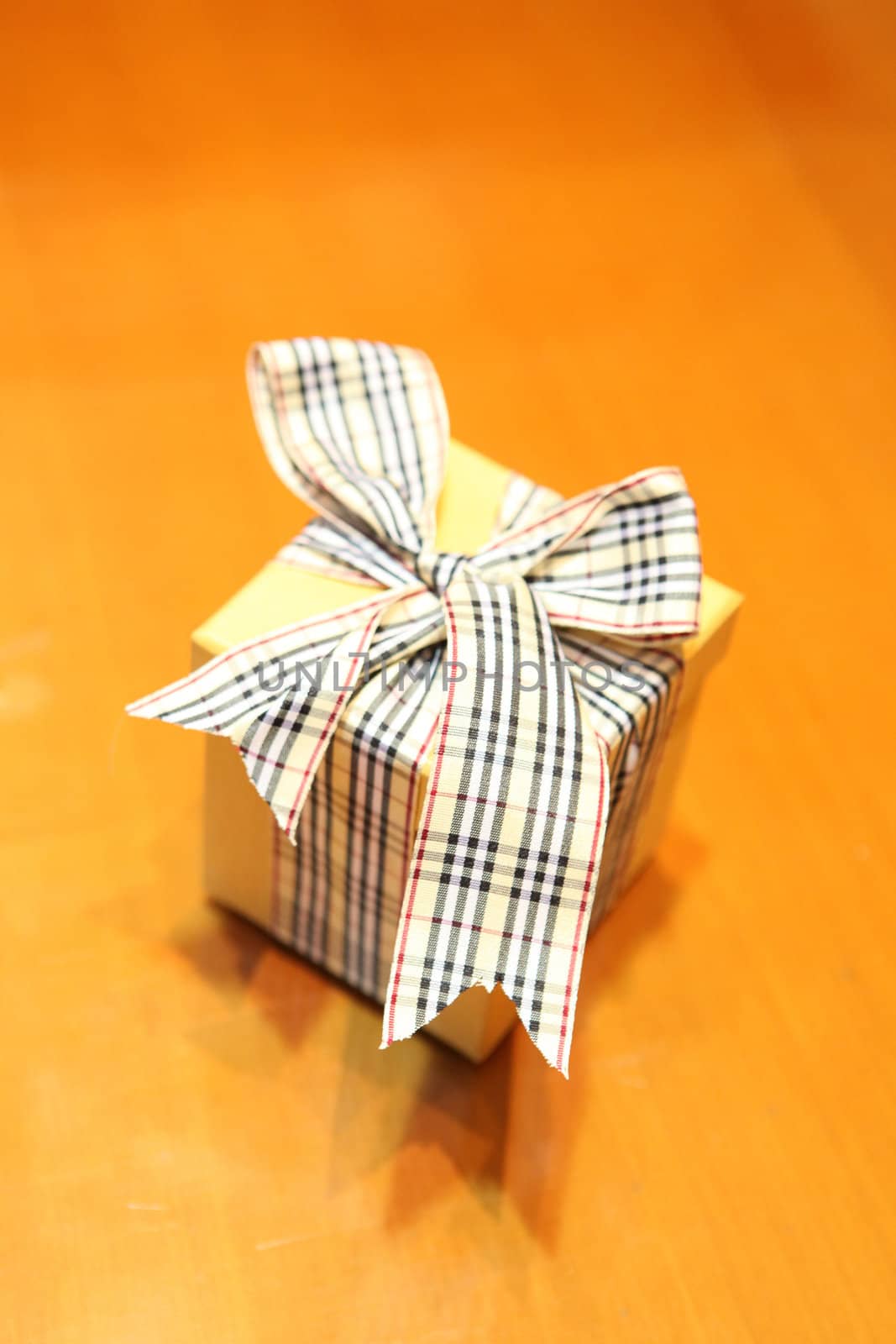 gift box on store table with soft blur background