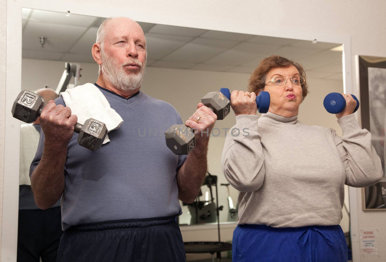 Senior Adult Couple Working Out by Feverpitched
