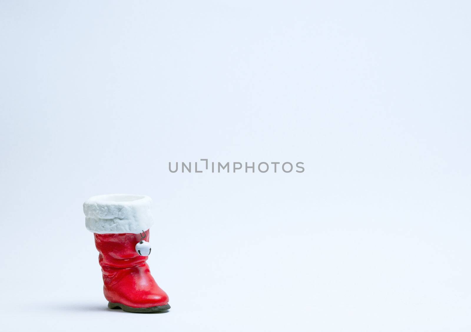 Santas Red Boot Christmas Tree Decoration on a white background.