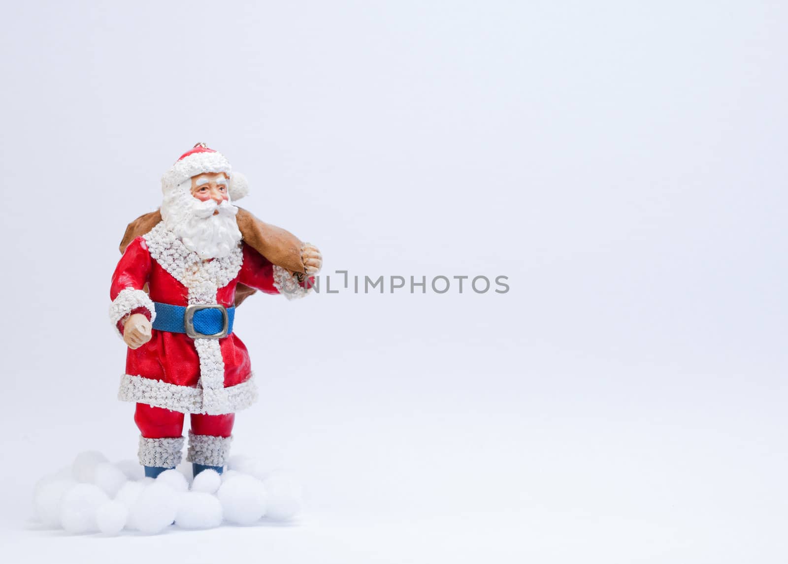 Father Christmas decoration on a white background.