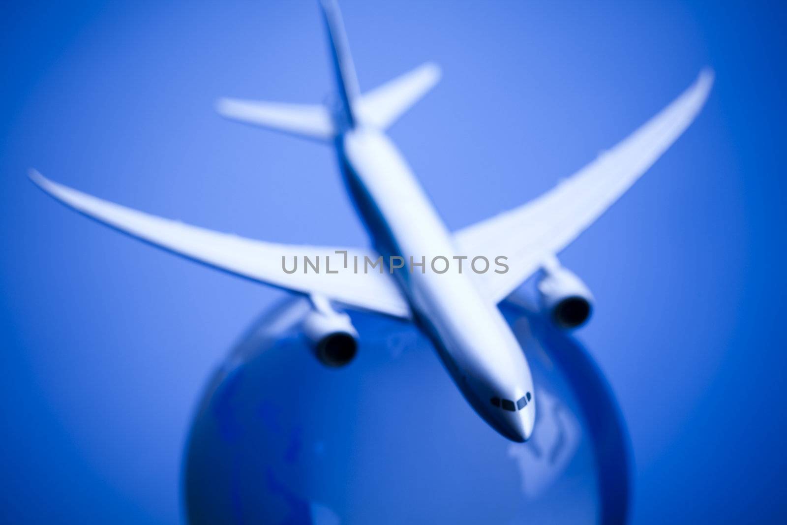 Airliner with earth in the blue background by JanPietruszka