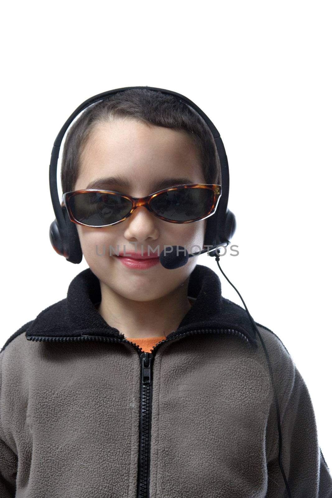 Smiling child wearing headset by jpcasais