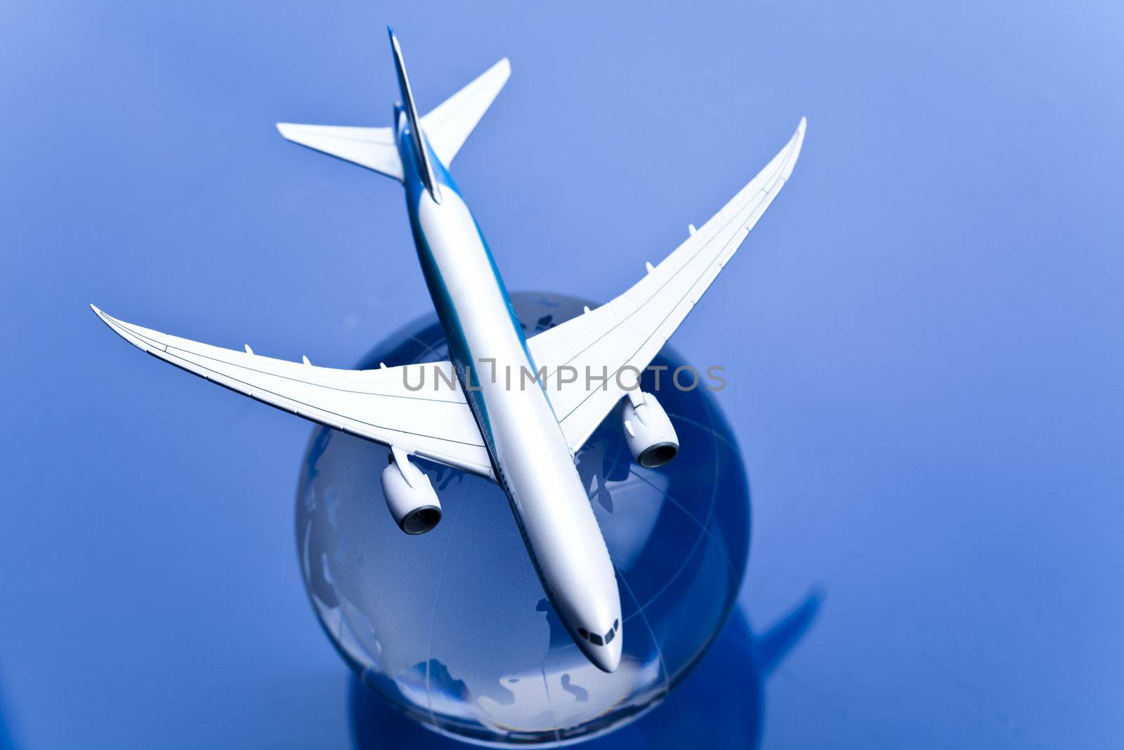 Airliner with earth in the blue background by JanPietruszka
