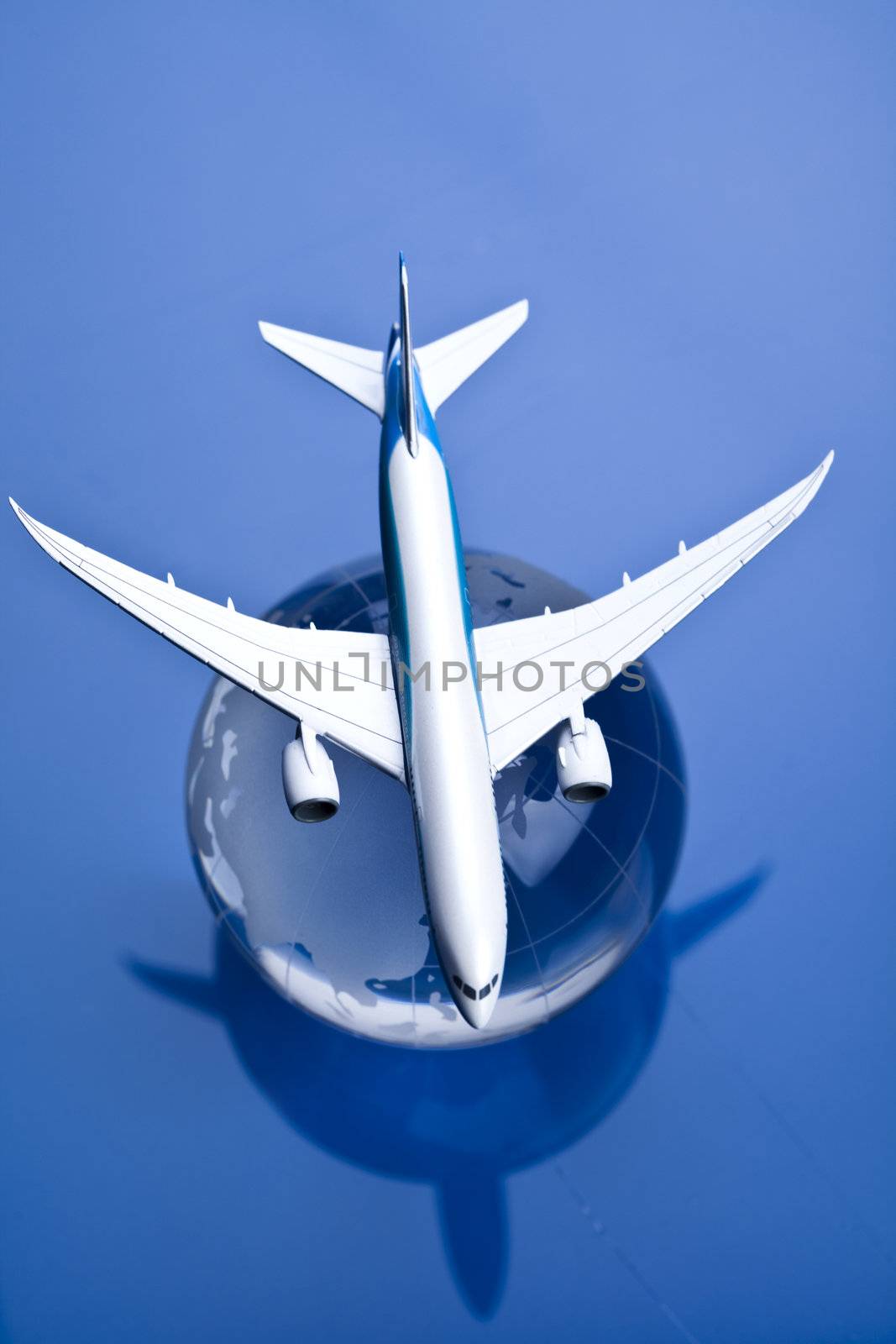 Airliner with earth in the blue background by JanPietruszka