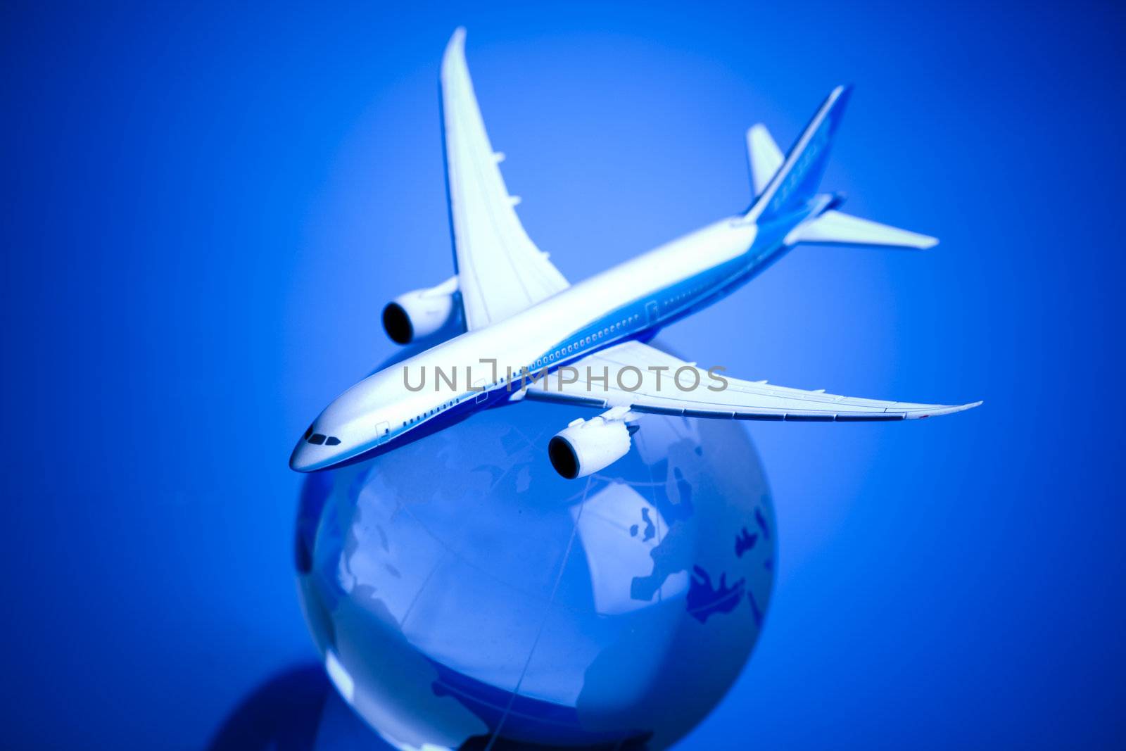 Airliner with earth in the blue background by JanPietruszka