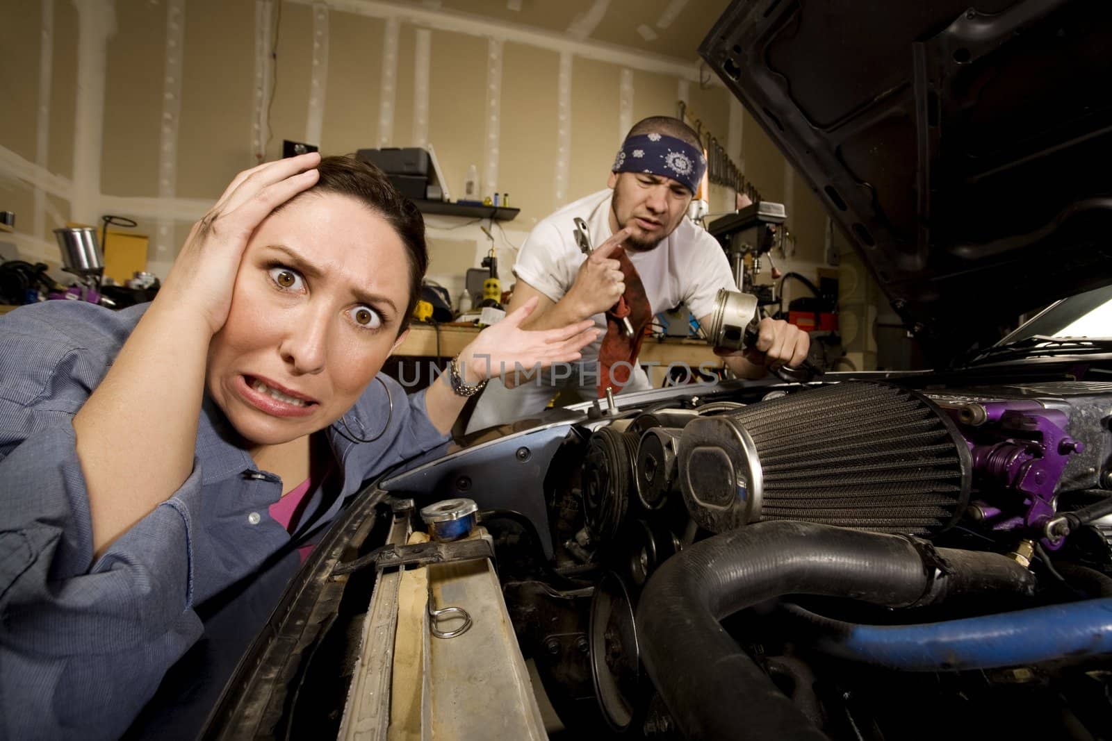 Frustrated woman with incompetent mechanic in background by Creatista