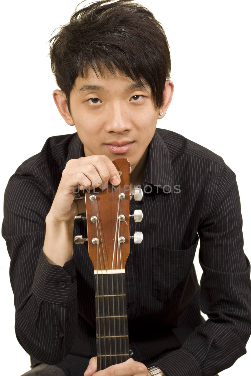 asia boy plays his guitar  by cozyta