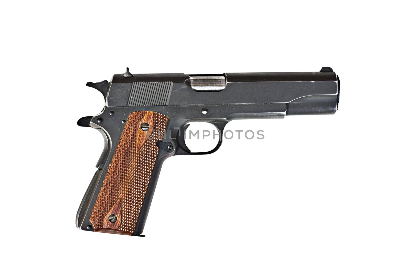 A 45 mm handgun with scratches isolated on a white background
