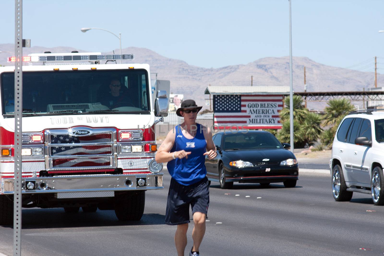 Tour of Duty Bradley Iverson (Las Vegas Firefighter) running in las vegas on Nellis BLVD. on Aug. 15th 2010