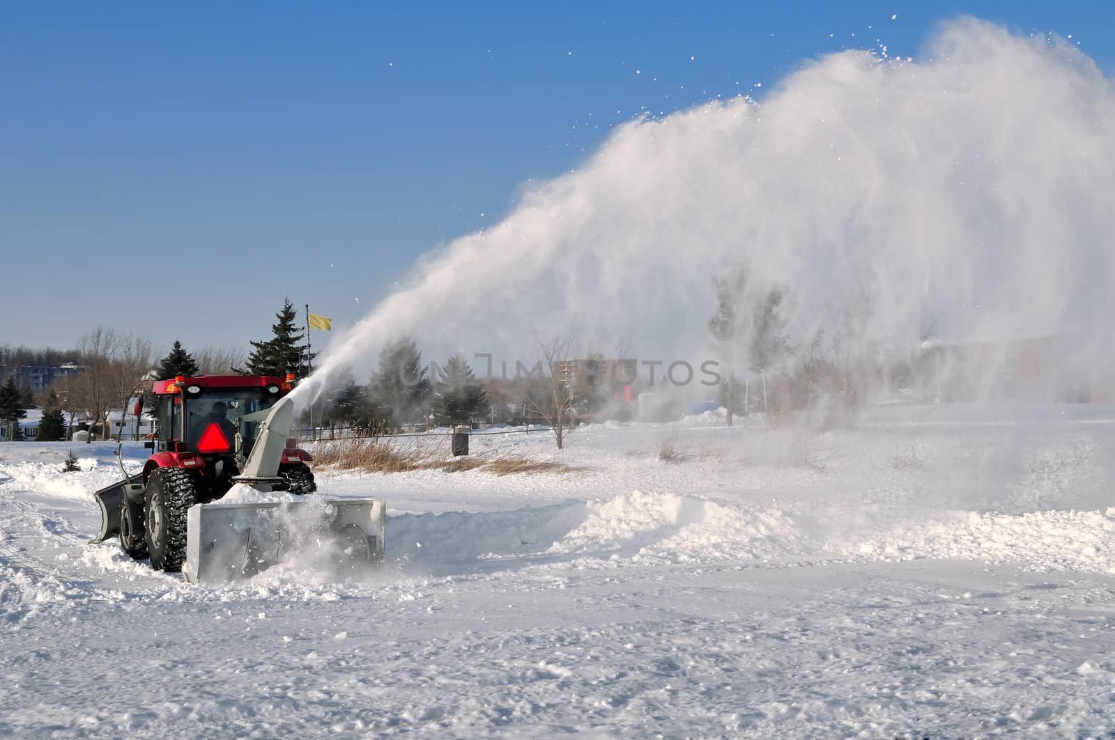 Snow removal on a frozen lake