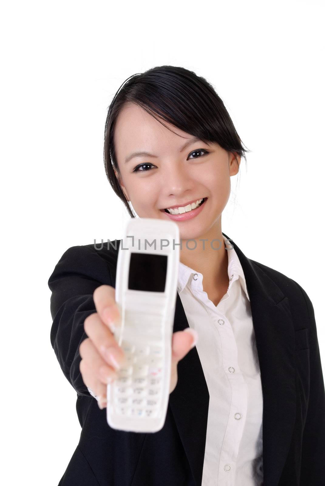 Portrait of happy business woman holding mobile phone on white background.