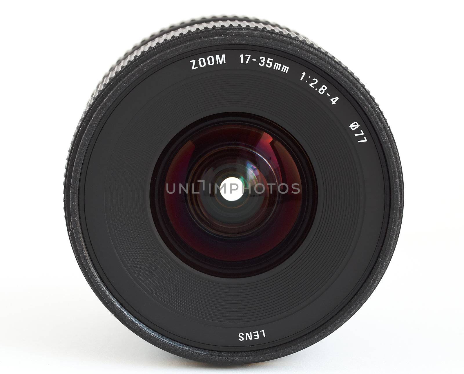 Wide angle zoom lens for SLR camera over white background