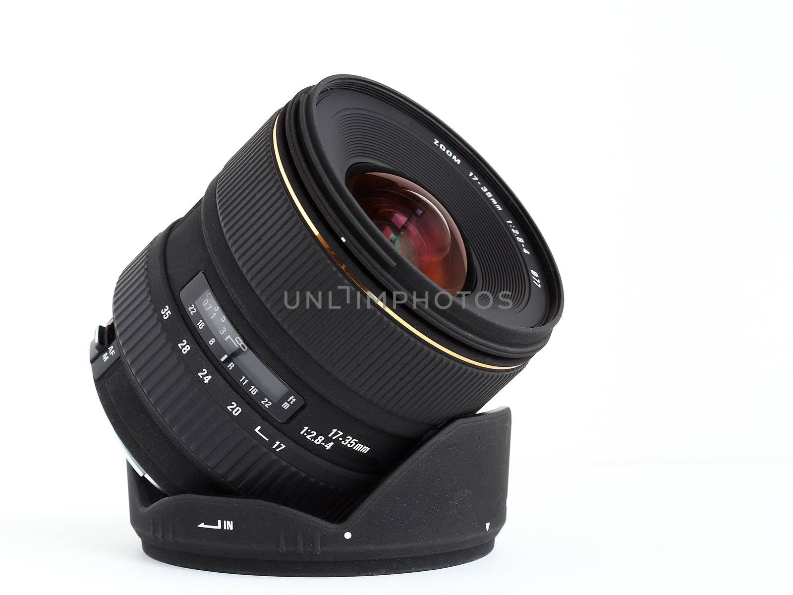 Wide-angle lens for DSLR camera over white background