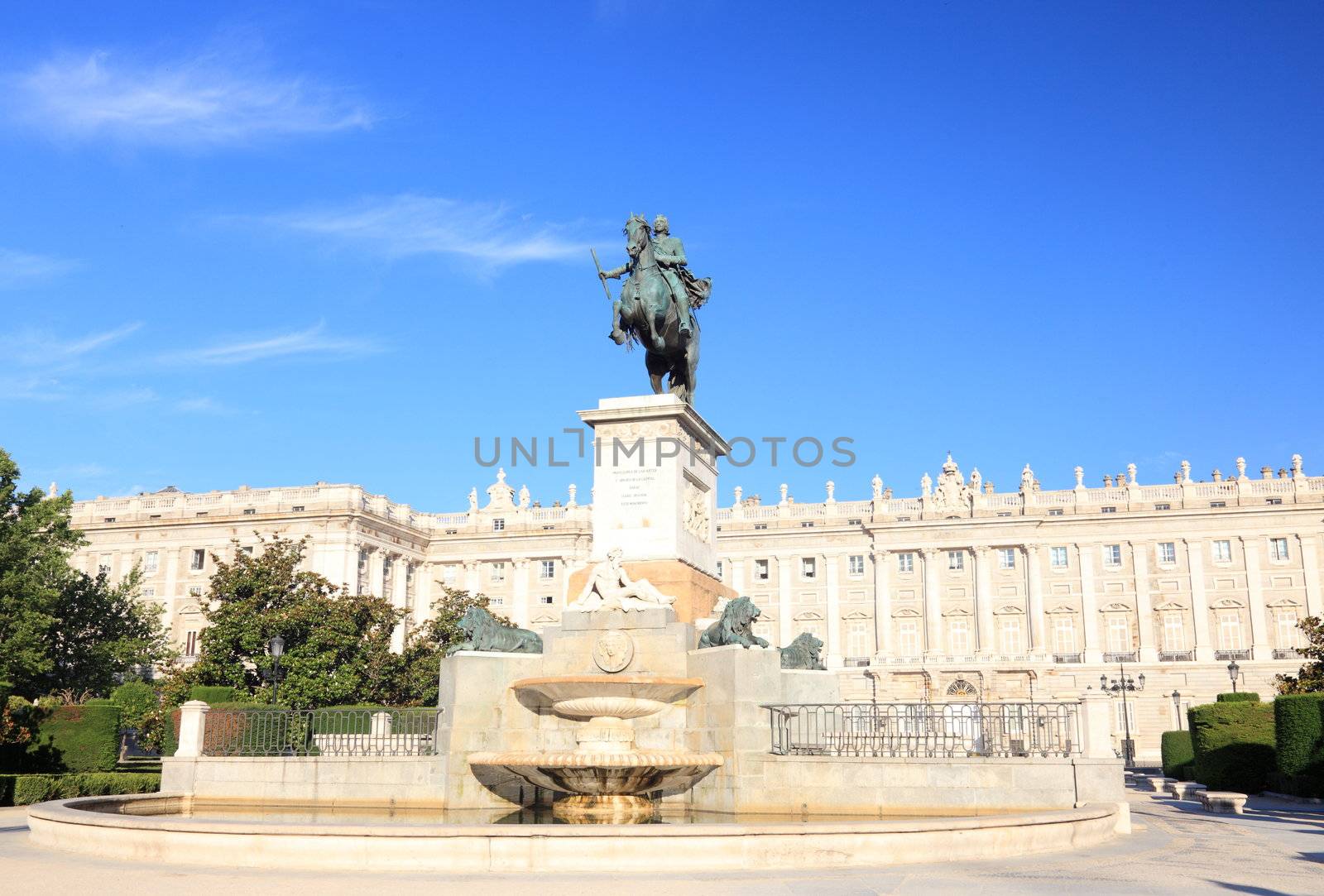 Madrid Plaza de Oriente, statue of Felipe IV. Famous landmark, Madrid, Spain with the Royal Palace, Palacio de Oriente in the background. 