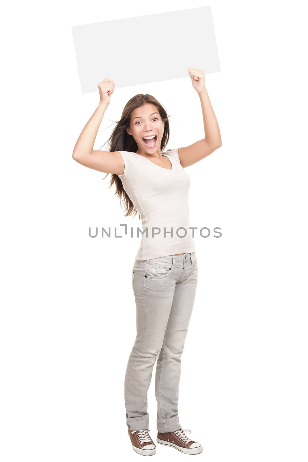 Blank sign. Woman holding empty blank white sign above her head. Excited and screaming beautiful young woman isolated on white background standing in full length. 